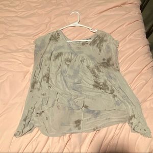 Loose fitting tan shirt